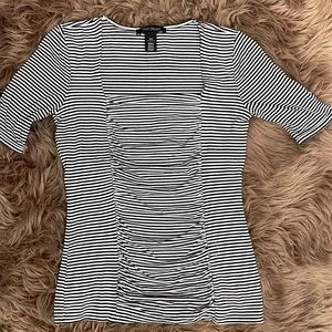 Black and white striped form fitting top. Size x s
